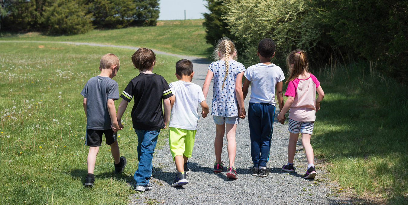 Kids holding hands in the best Christian schools in Virginia