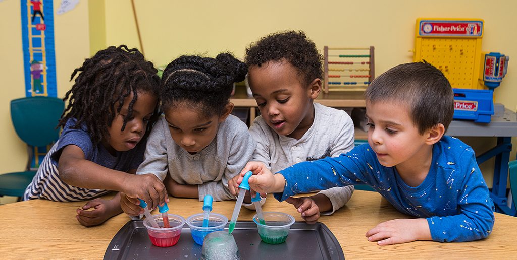 preschool kids doing a fun experiment in a resourcing christian education