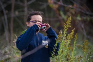 A student at Christian Middle School in Virginia learns photography